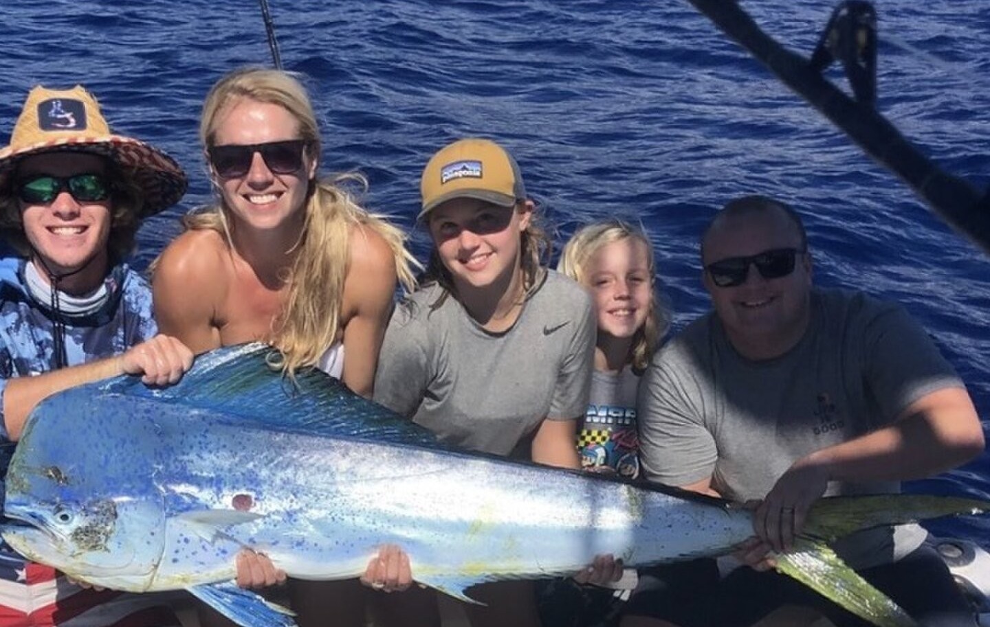 Mahi mahi fishing success in Kailua-Kona Hawaii with large catch displayed on boat