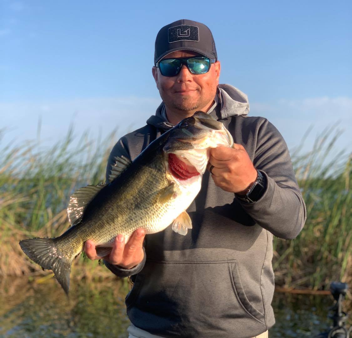 A person fishing in Fellsmere