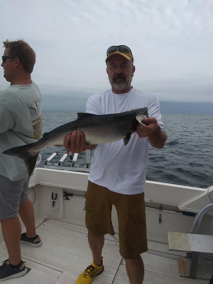 Two anglers fishing in Oswego