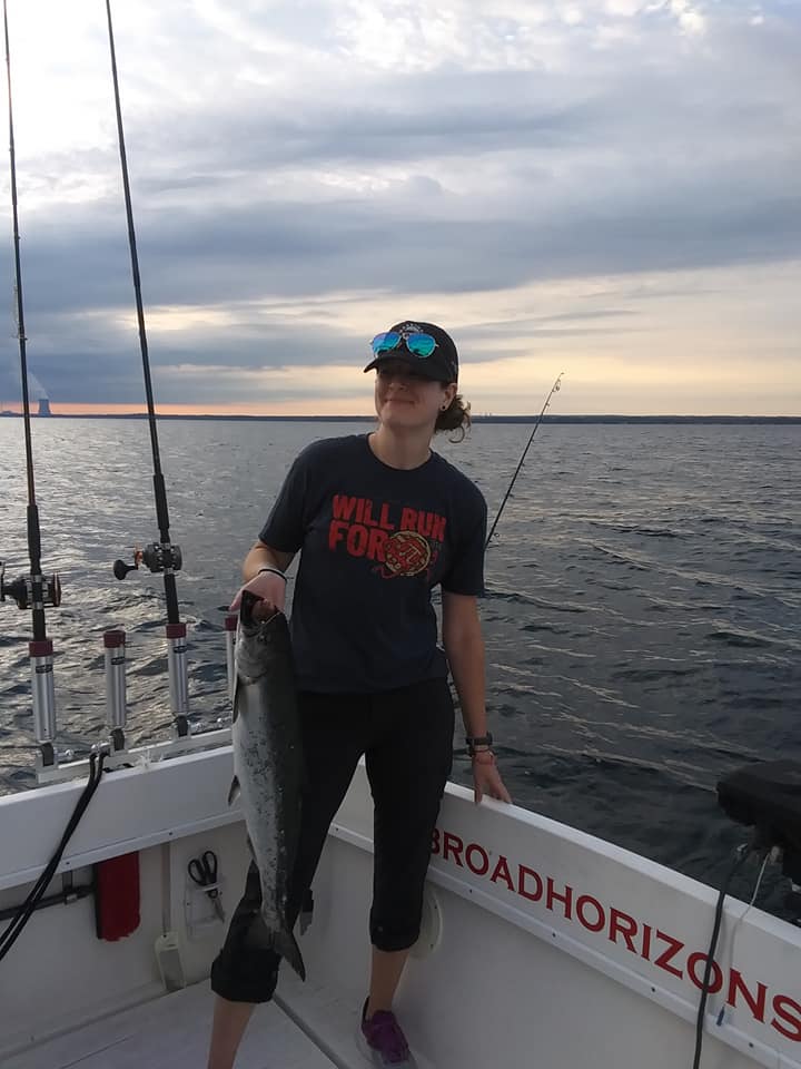 A lone angler fishing in Oswego