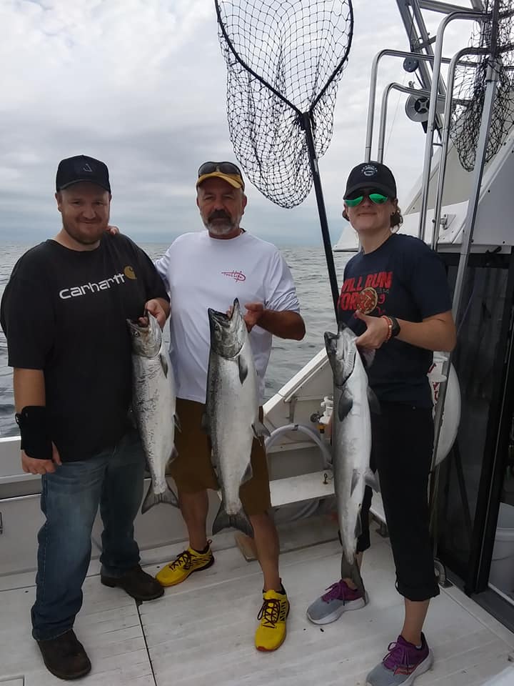 3 chinook salmon and pink salmon caught on a fishing trip in NY