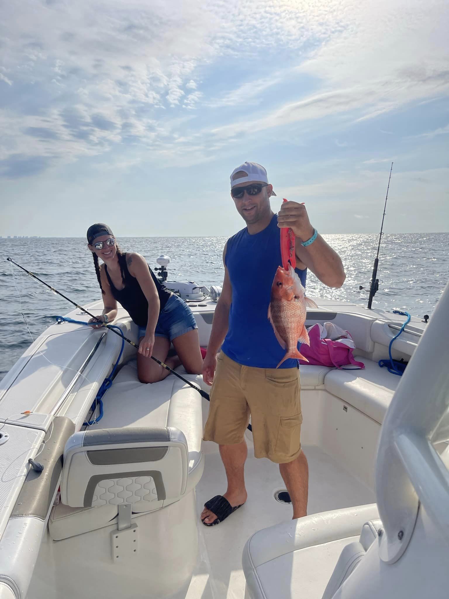 Two anglers with a large fish in Fort Walton Beach