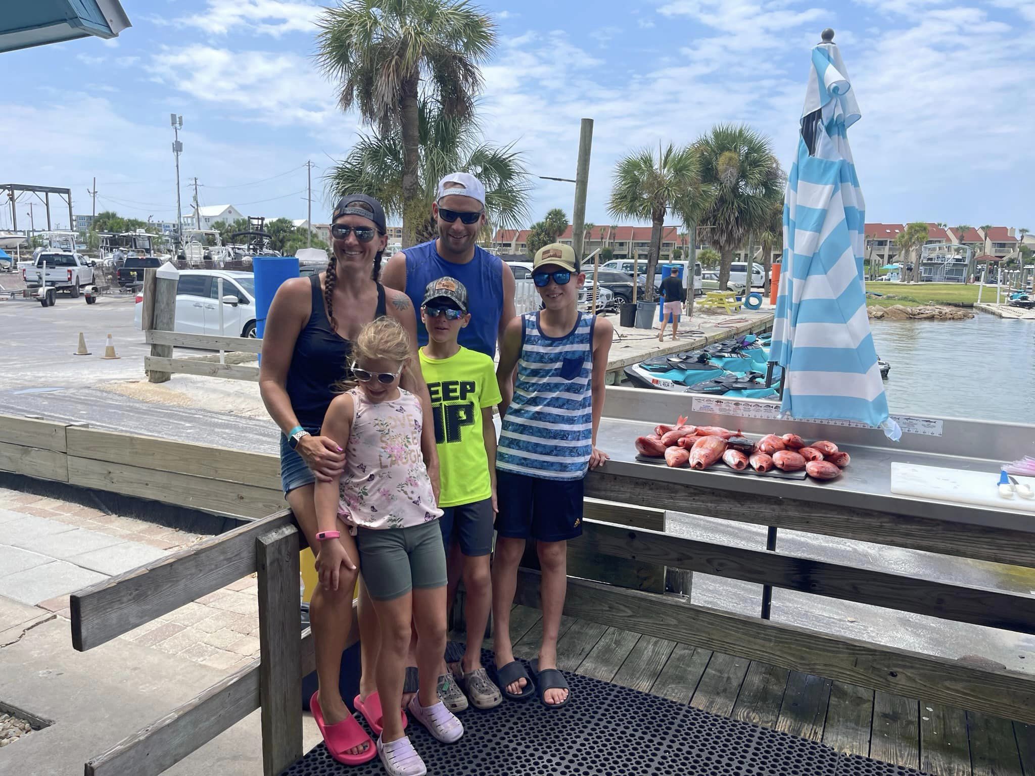 A group of 5 people fishing in Fort Walton Beach