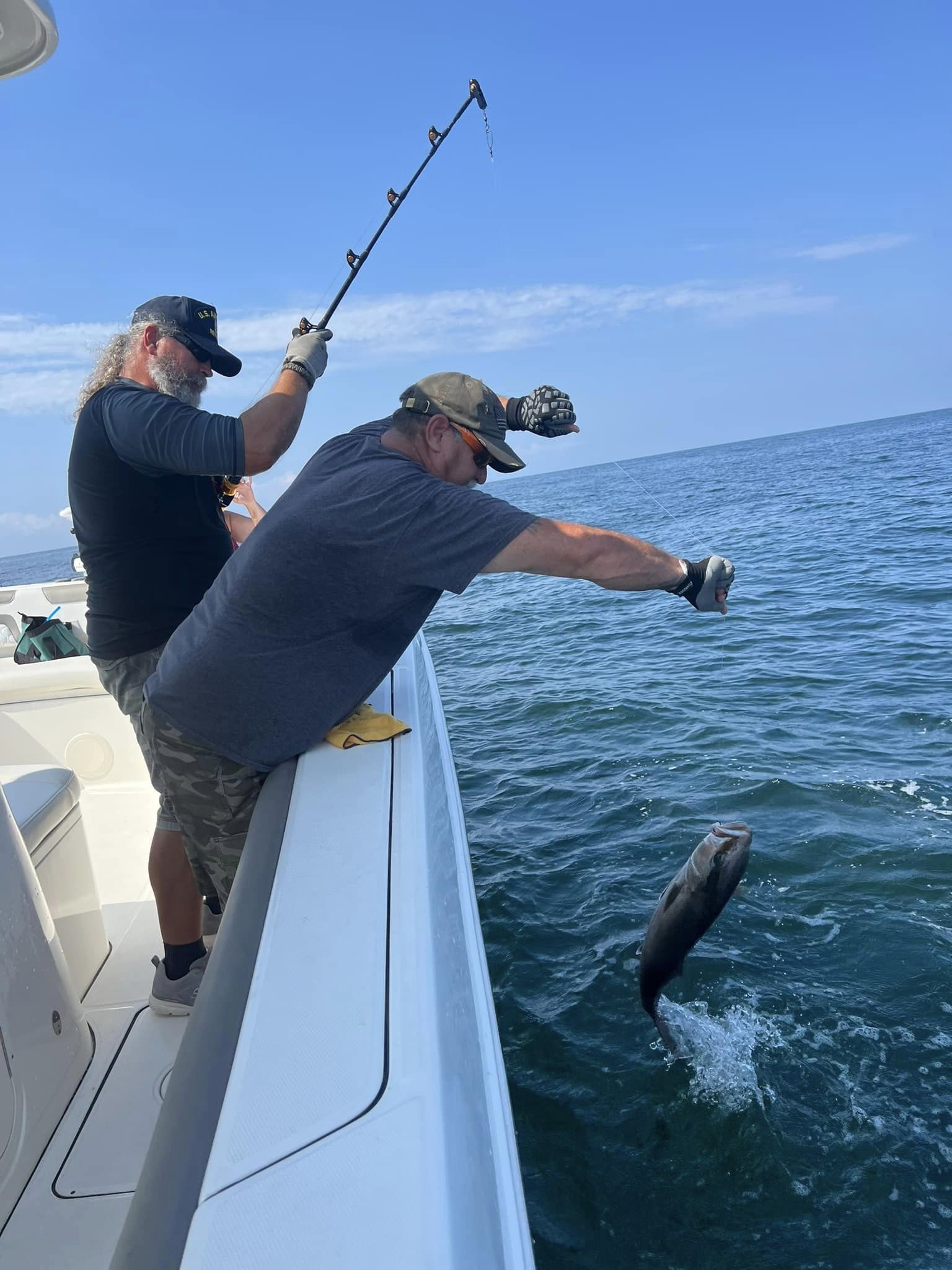 A group of 3 people fishing in Florida