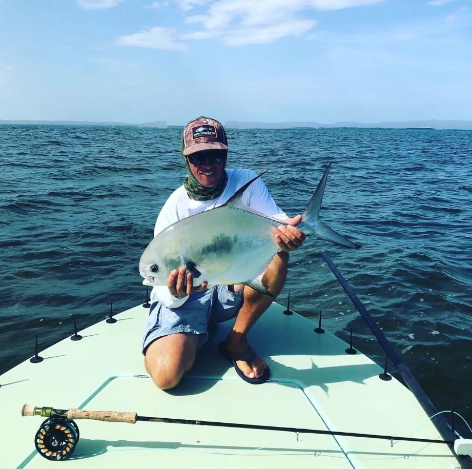 Angler with fishing rod enjoying the outdoors in FL