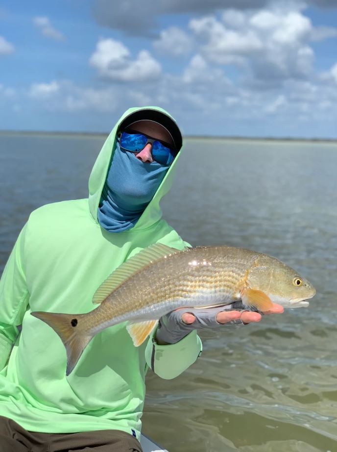 Angler with a 21-inch fish catch in FL