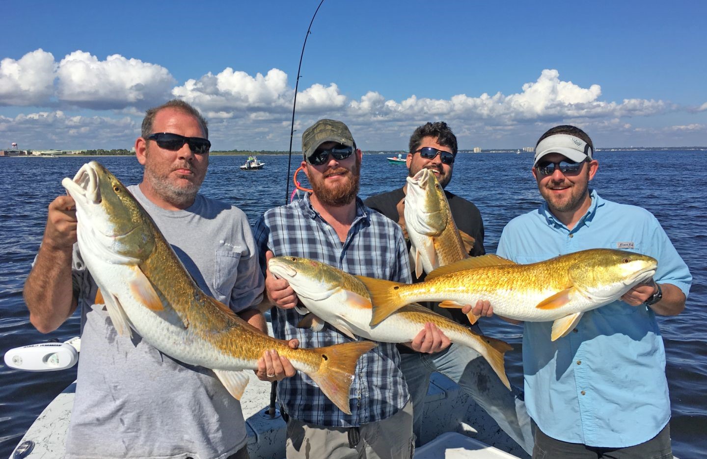 2 anglers holding their catch of big fish in Florida