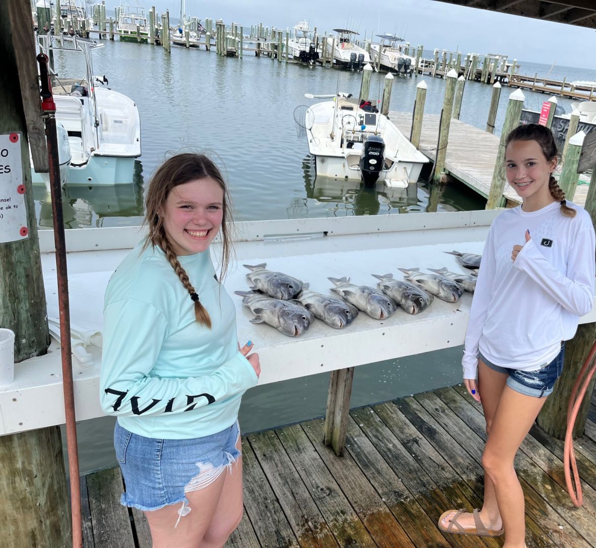 Two people fishing at the beach in Gulf Shores
