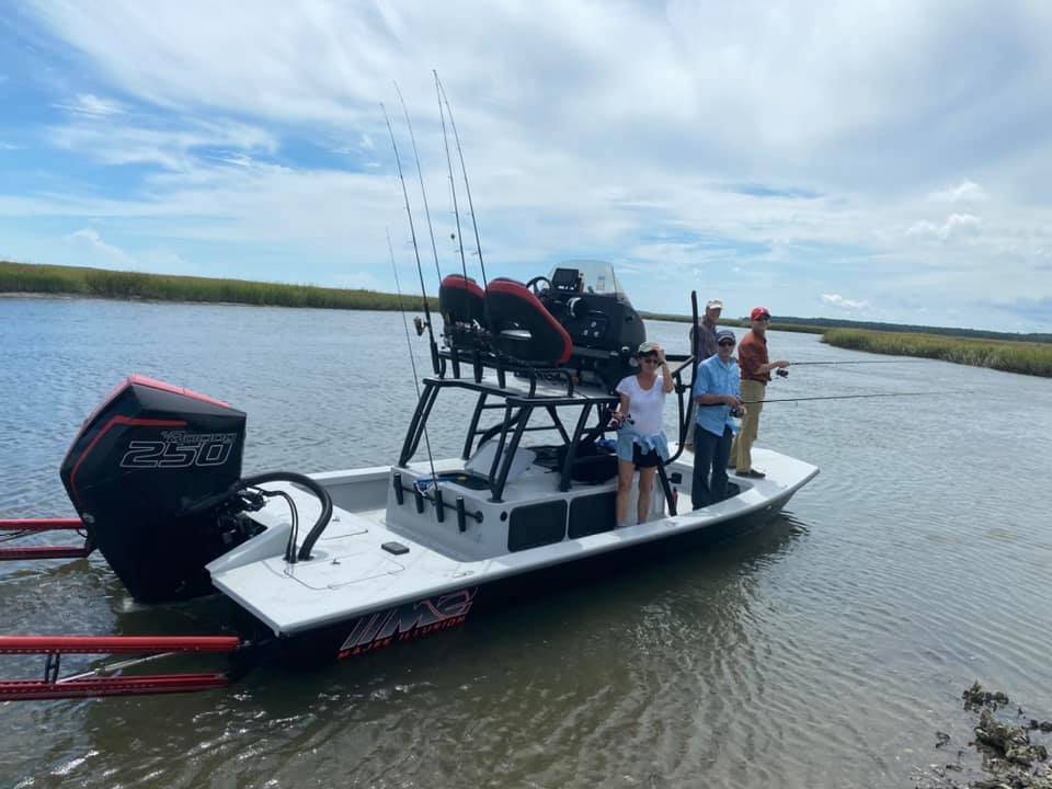 Three anglers pose for a photo in SC