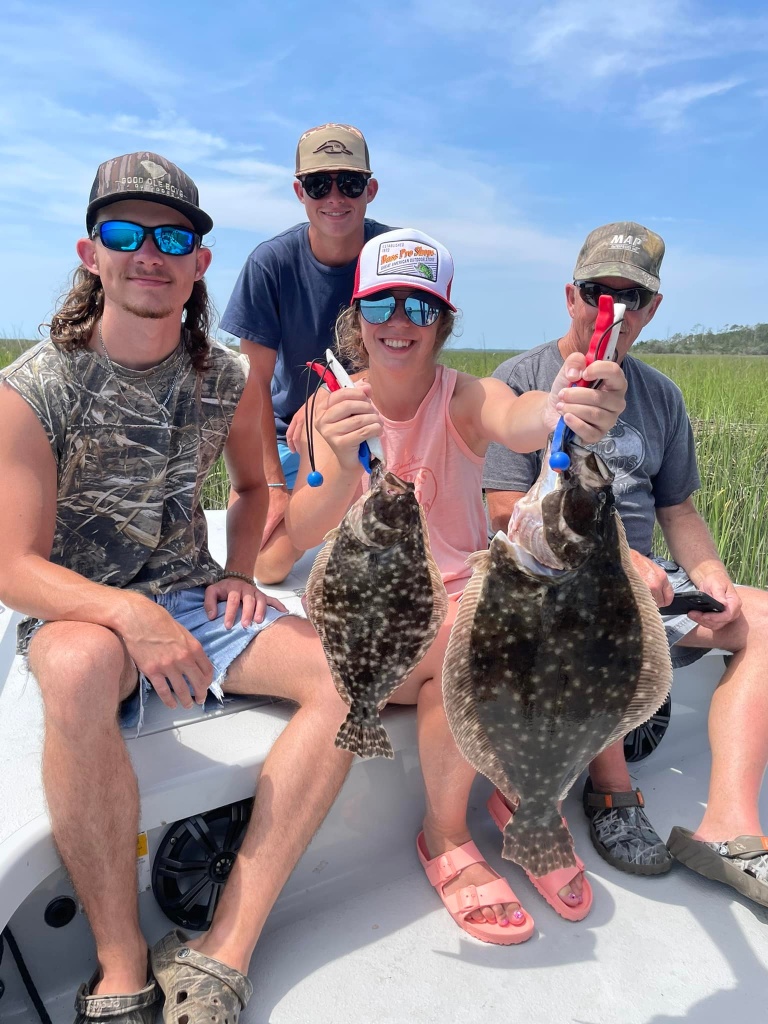 Two summer flounder fish caught in Georgetown