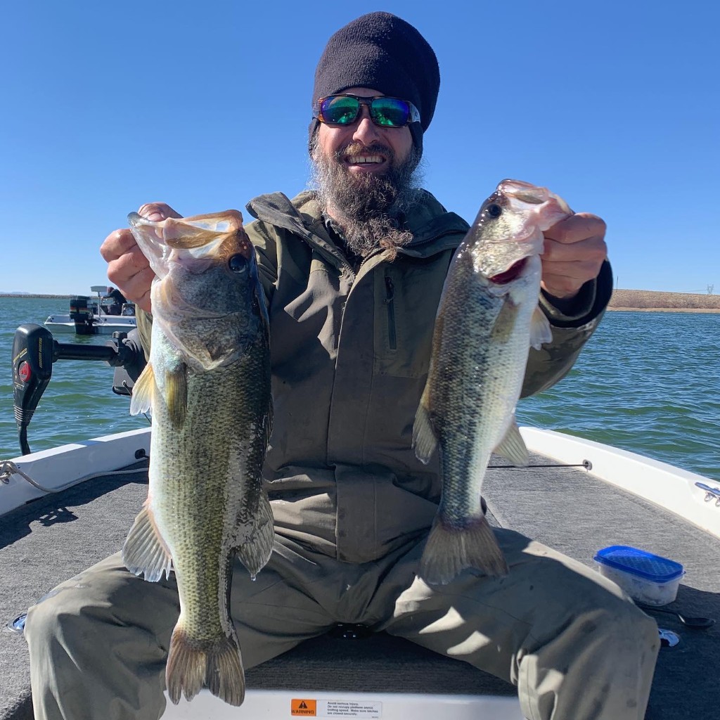 Two largemouth bass caught fishing in Arboles