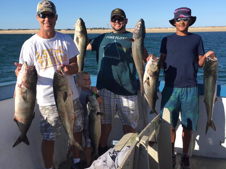 Provincetown offshore fishing charter boat at sunrise targeting striped bass and bluefish