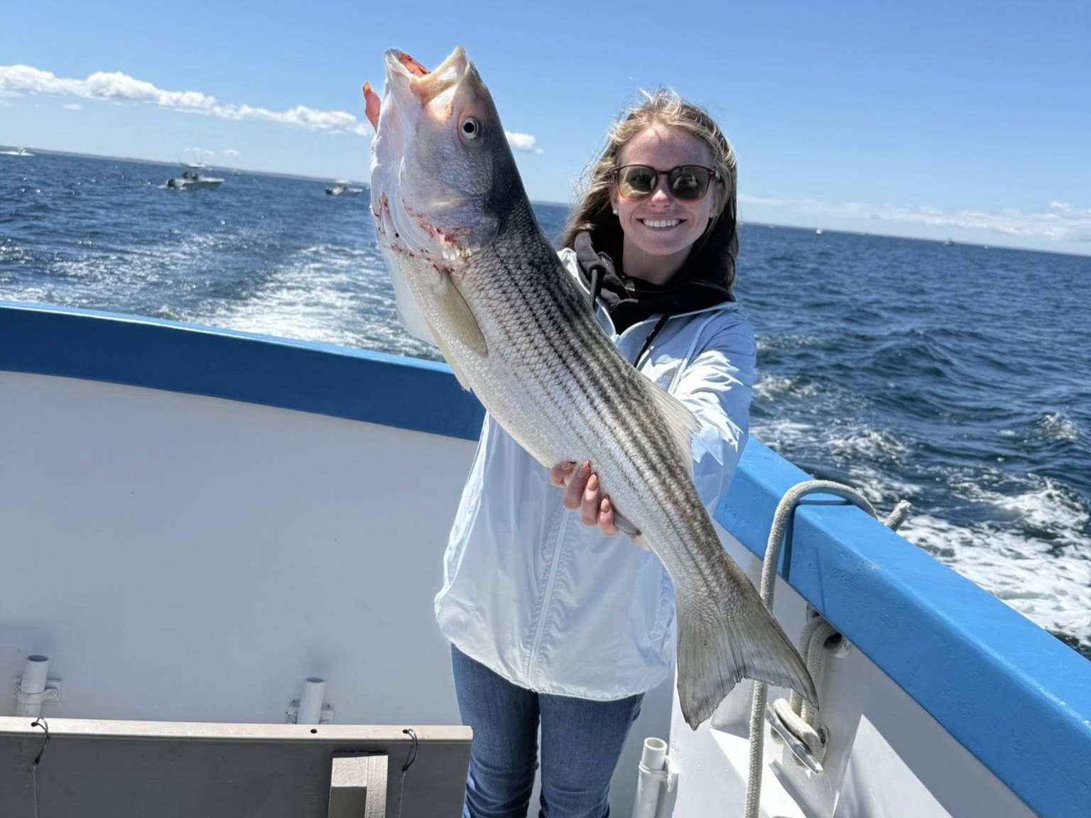 Provincetown offshore fishing boat with anglers targeting striped bass and bluefish on 8-hour charter