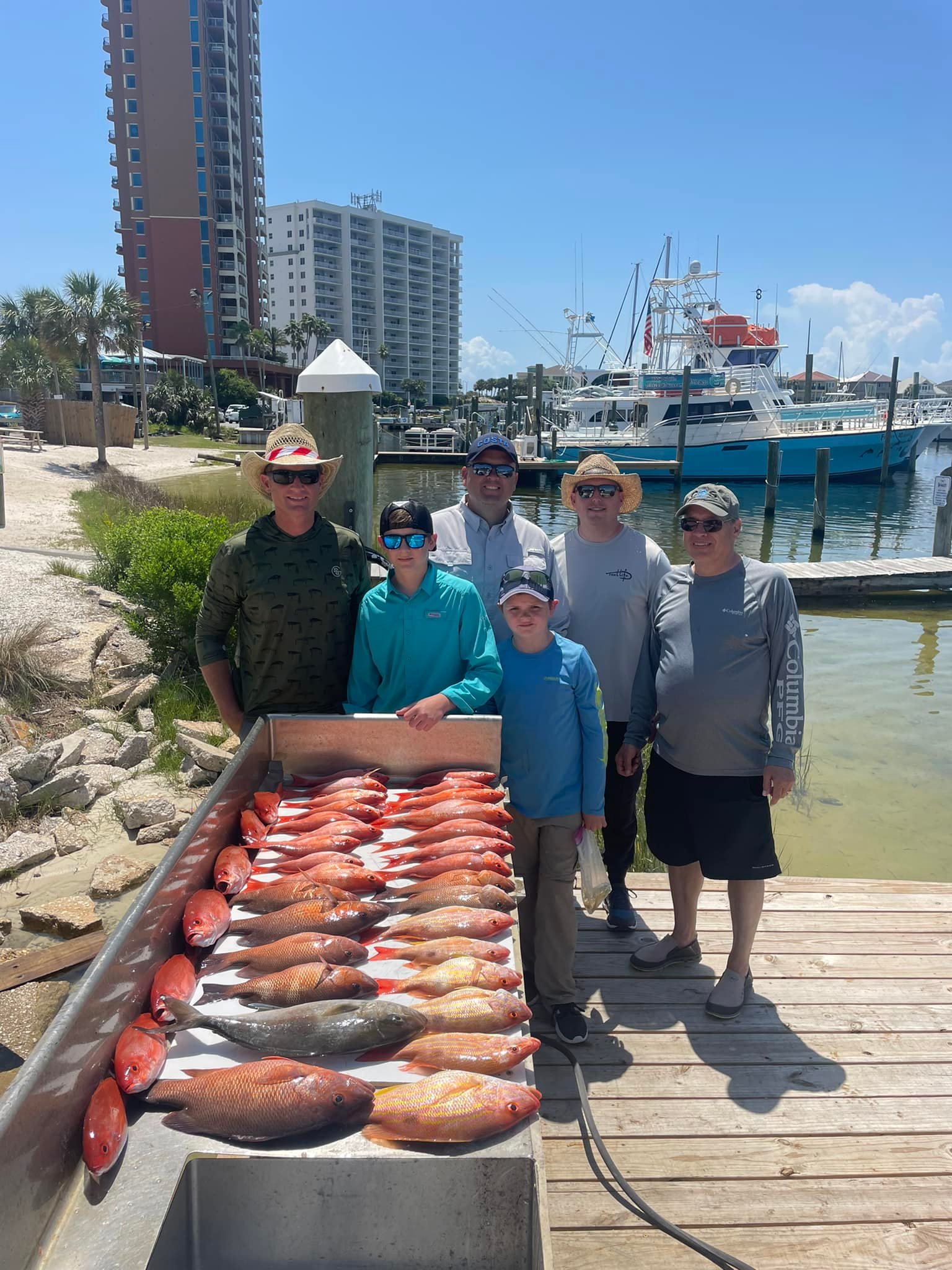 Three huge greater amberjack caught while fishing at Pensacola Beach