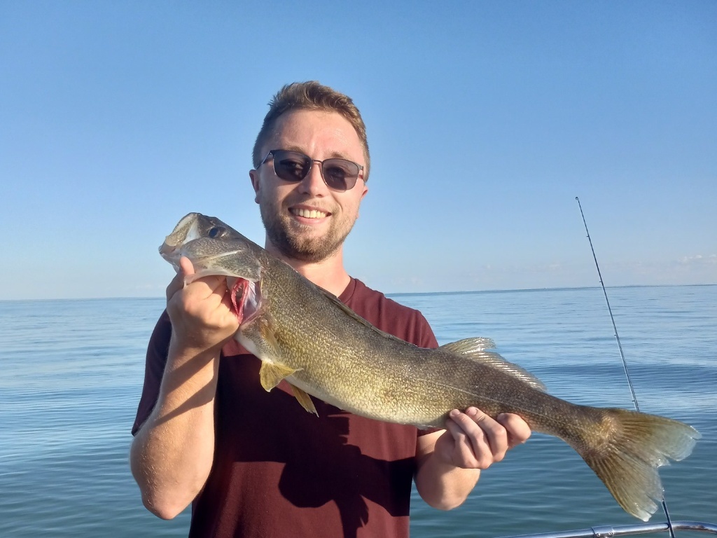 One person fishing at the lakeside in Marblehead