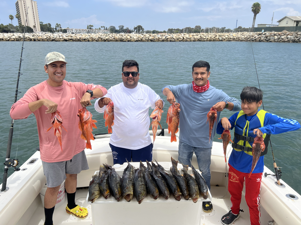 2 fishing rods and 4 people enjoying a day of fishing in CA.