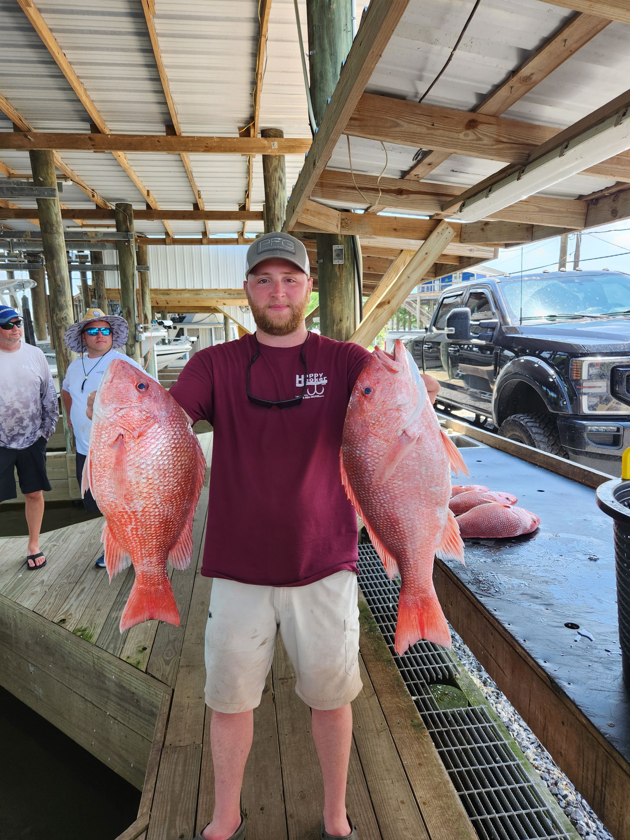 Louisiana offshore fishing charter boat on Gulf waters targeting snapper and sharks