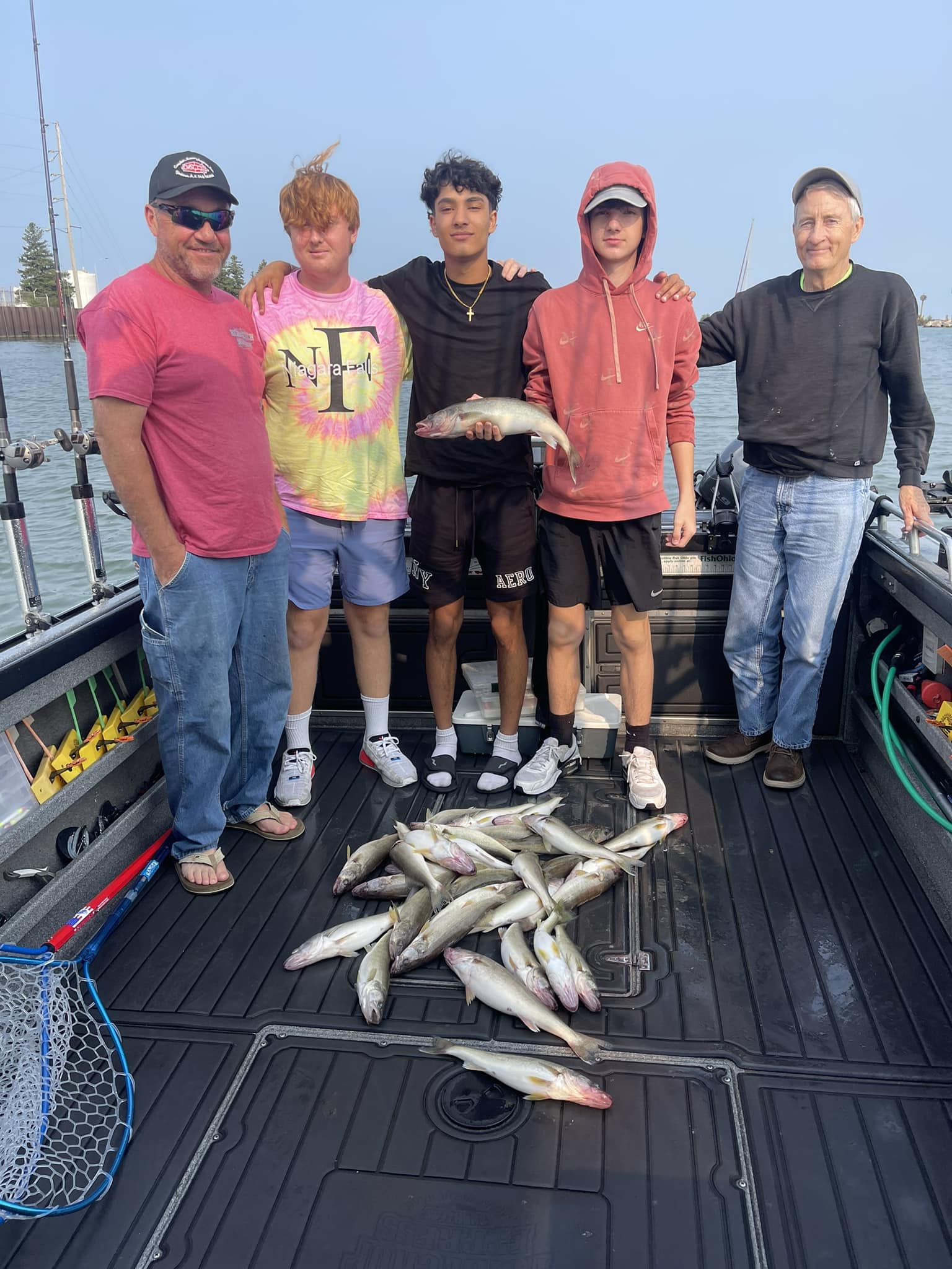5 people fishing in lakeside marblehead with 2 fish