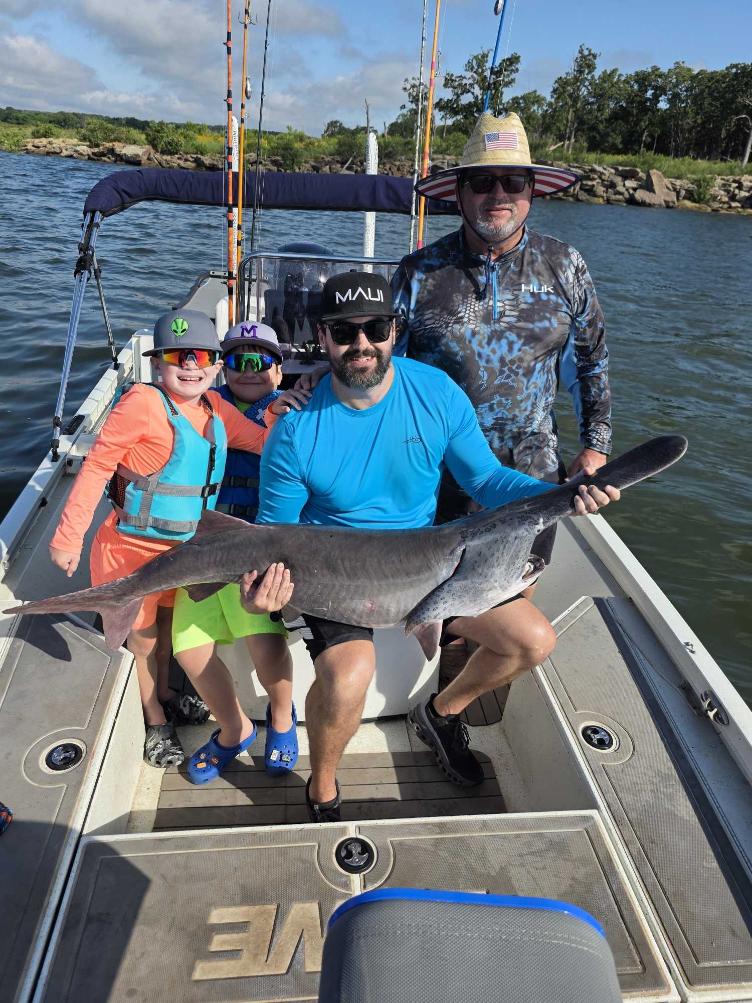 Fishing charter boat with large catfish catch in Glencoe OK waters