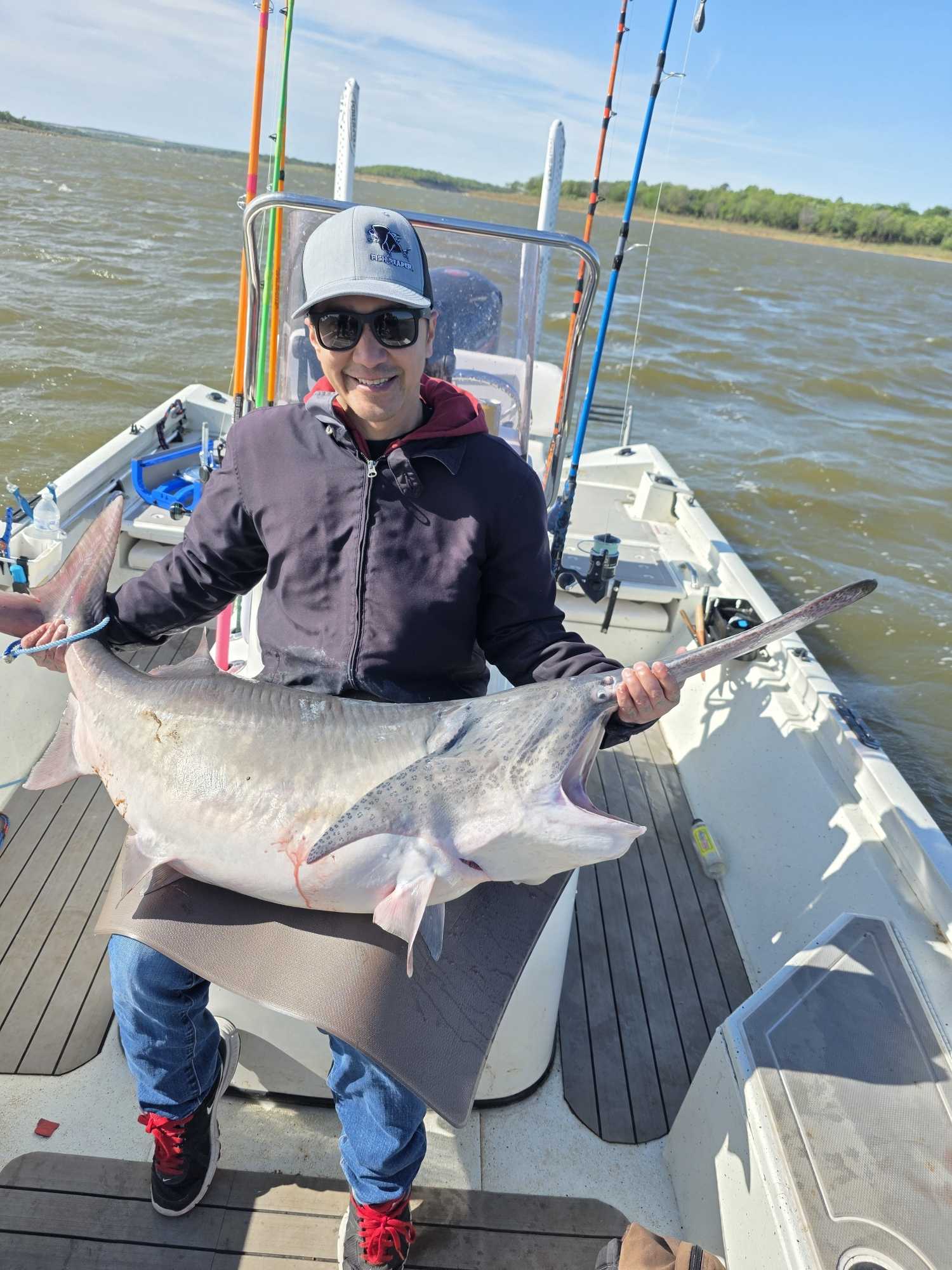 Large fish catch displayed on fishing boat deck in Glencoe OK
