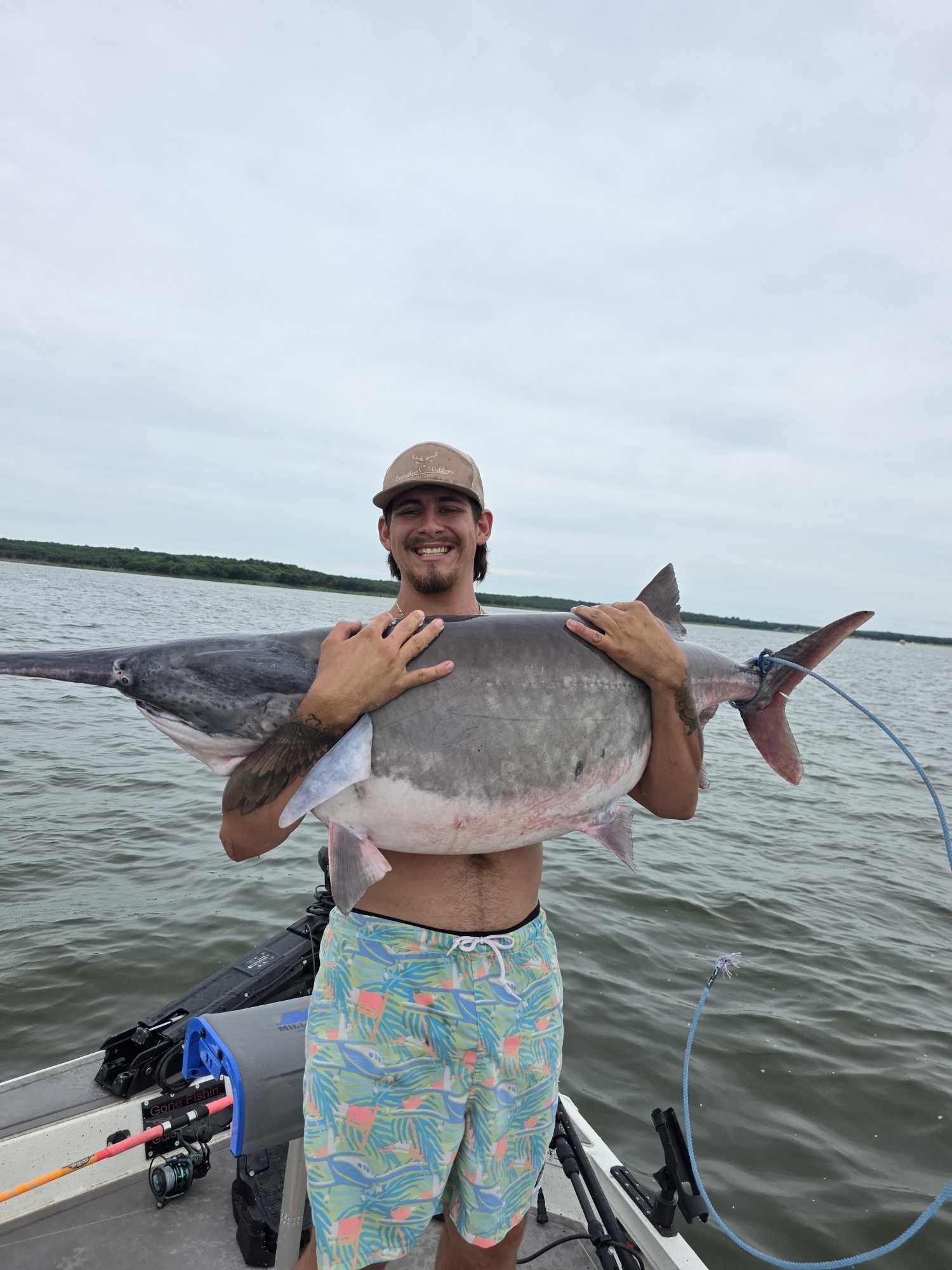 Large catfish catch held on fishing boat in Glencoe Oklahoma