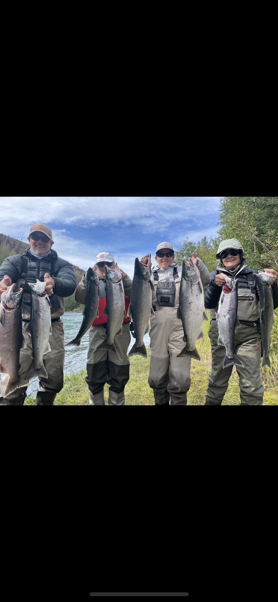 6 coho salmon and cutthroat trout caught in AK