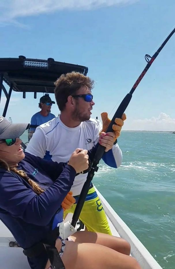 Trio of anglers enjoying a fishing trip at Port Isabel