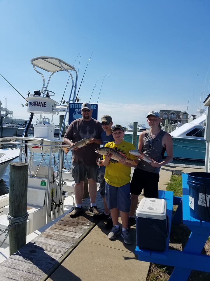 4 people fishing at Hatteras