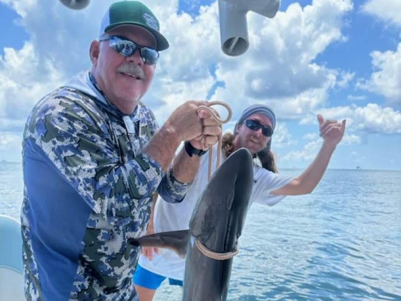 Two people fishing in LA