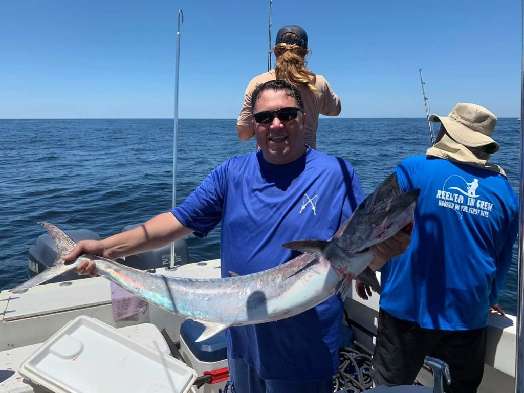 1 person with a big 28-inch fish caught at Surfside Beach