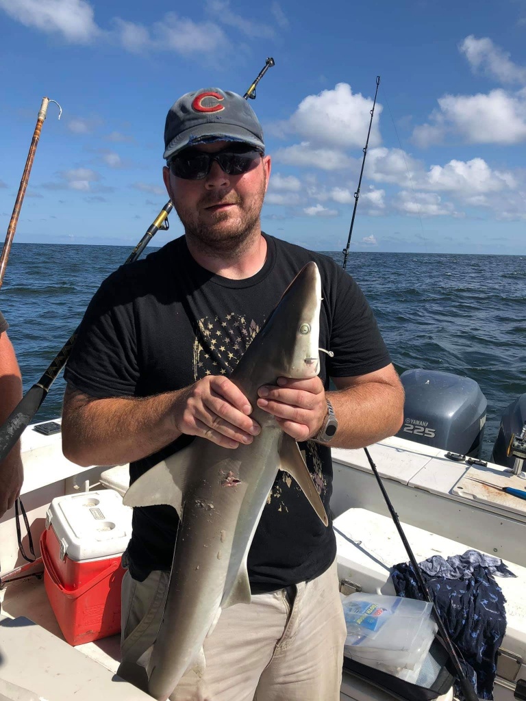 Angler holding a 20-inch fish in TX