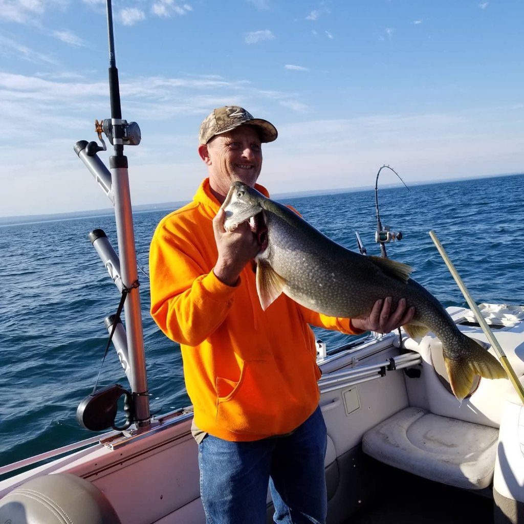 Angler with a big 24-inch fish on a PA fishing trip