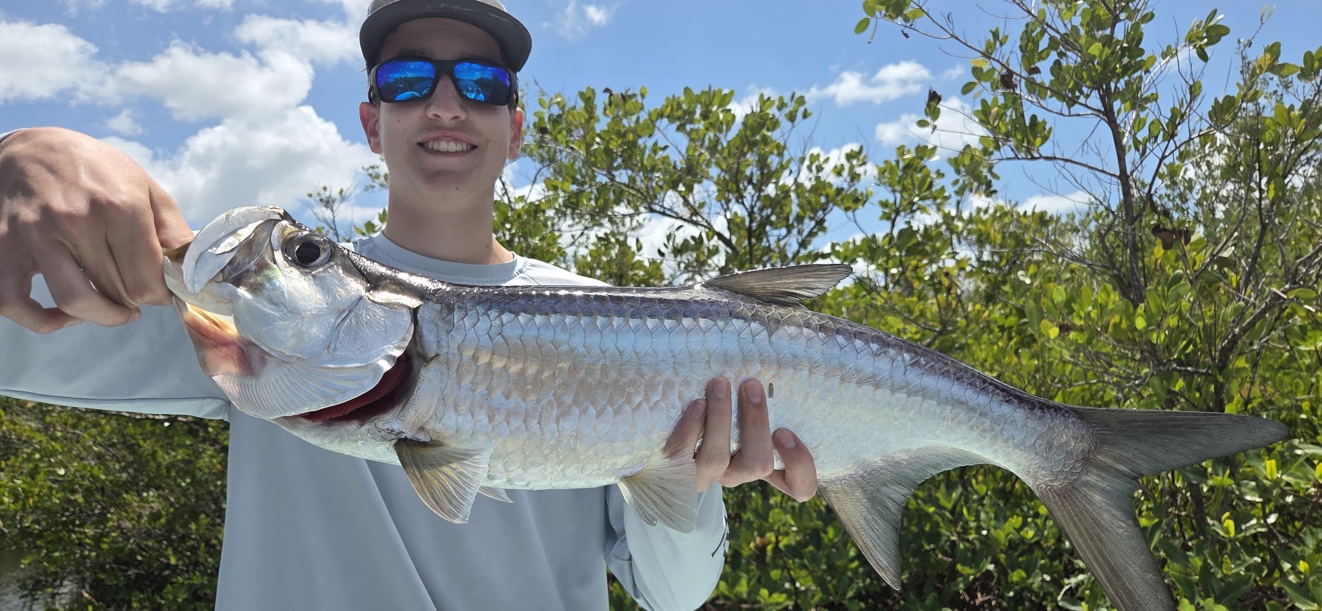Tarpon catch displayed after fishing trip in Naples FL