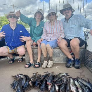 Four people enjoying fishing in Montgomery