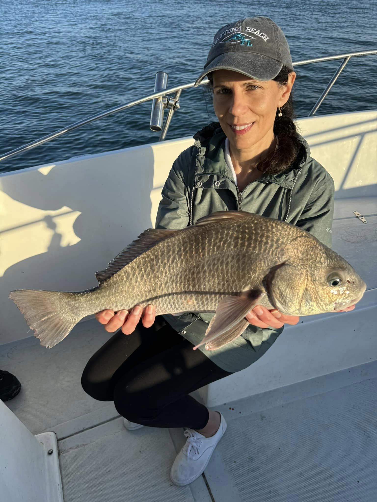 Angler catches a 23-inch Black Drum fish in FL