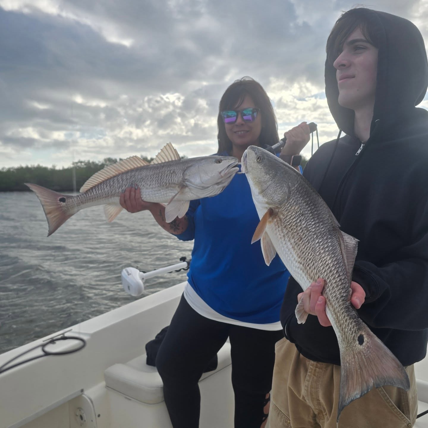 Two redfish caught during fishing trip in New Smyrna Beach FL