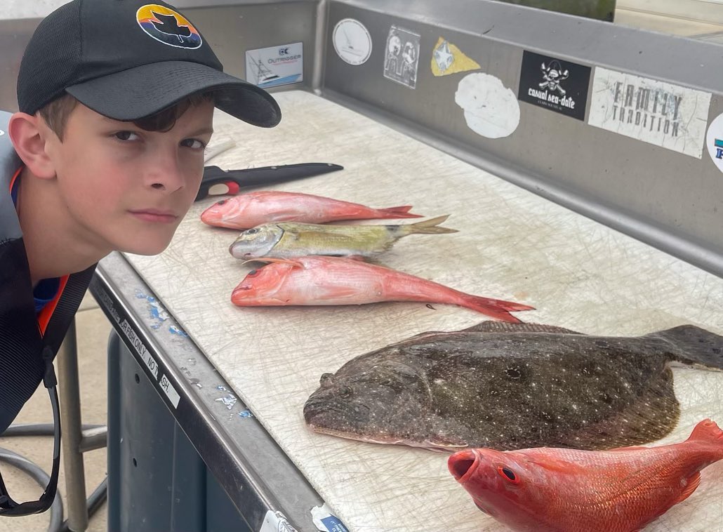 Two summer flounder fish caught fishing in SC