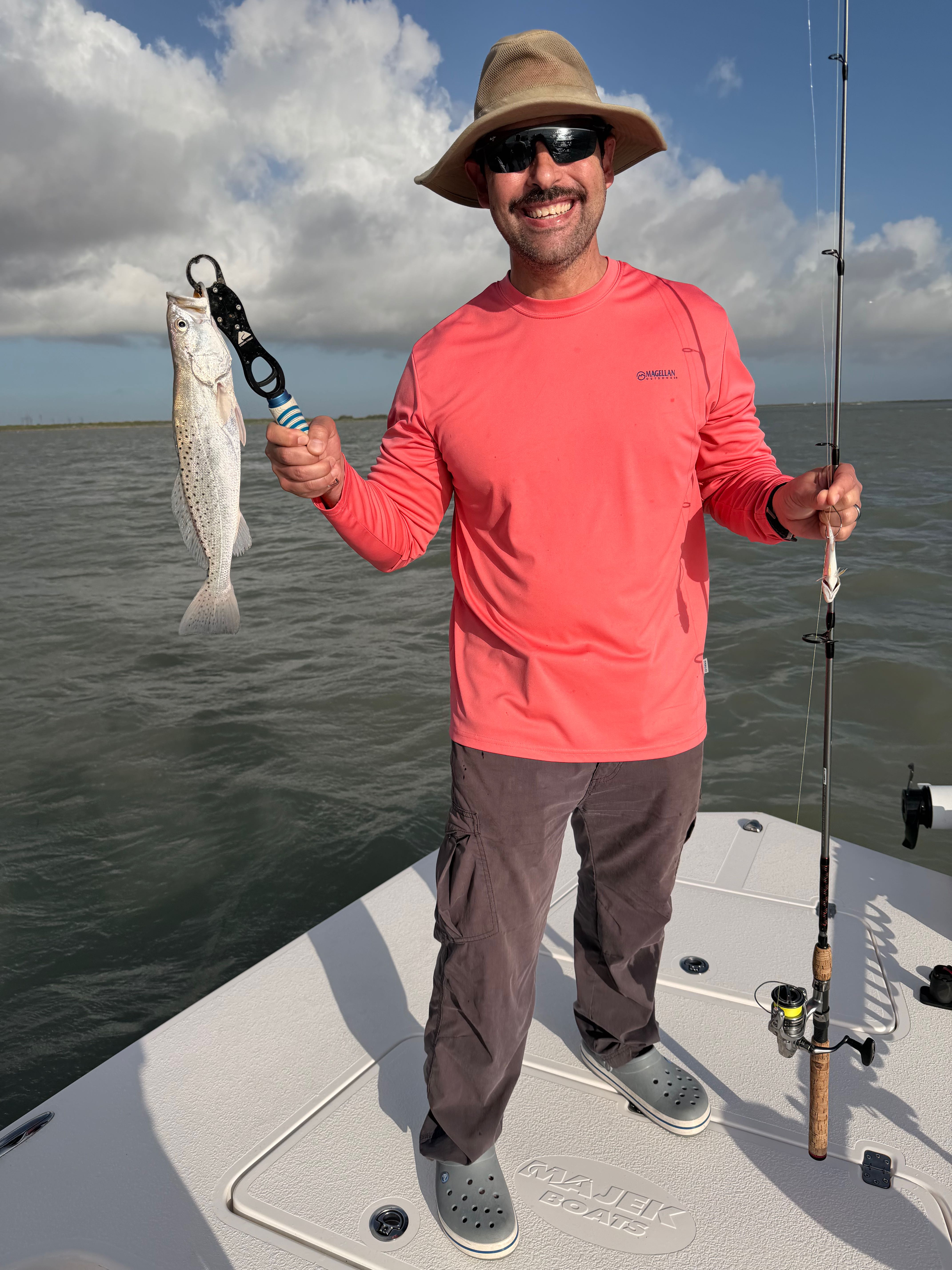 Speckled trout fishing success on boat in South Padre Island TX waters