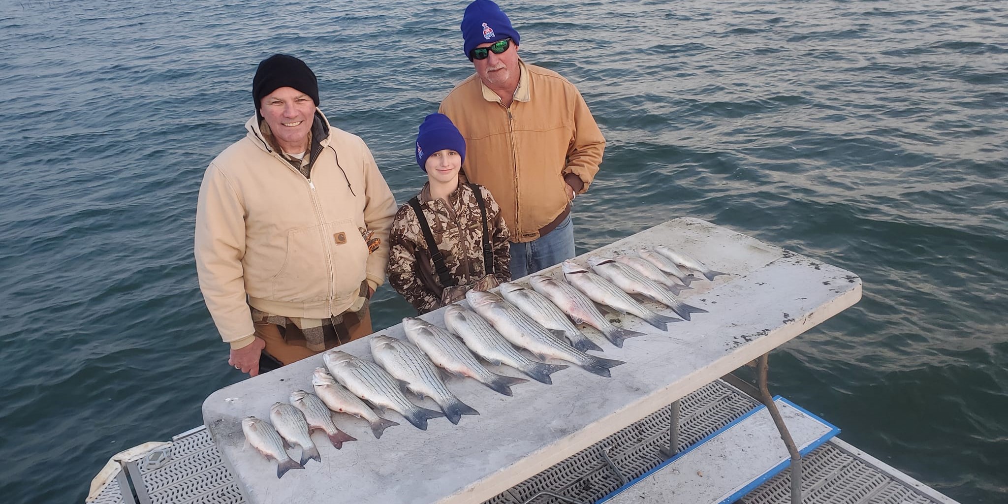 Three people fishing in TX