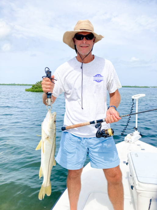Lone angler fishing in the waters of Fort Myers