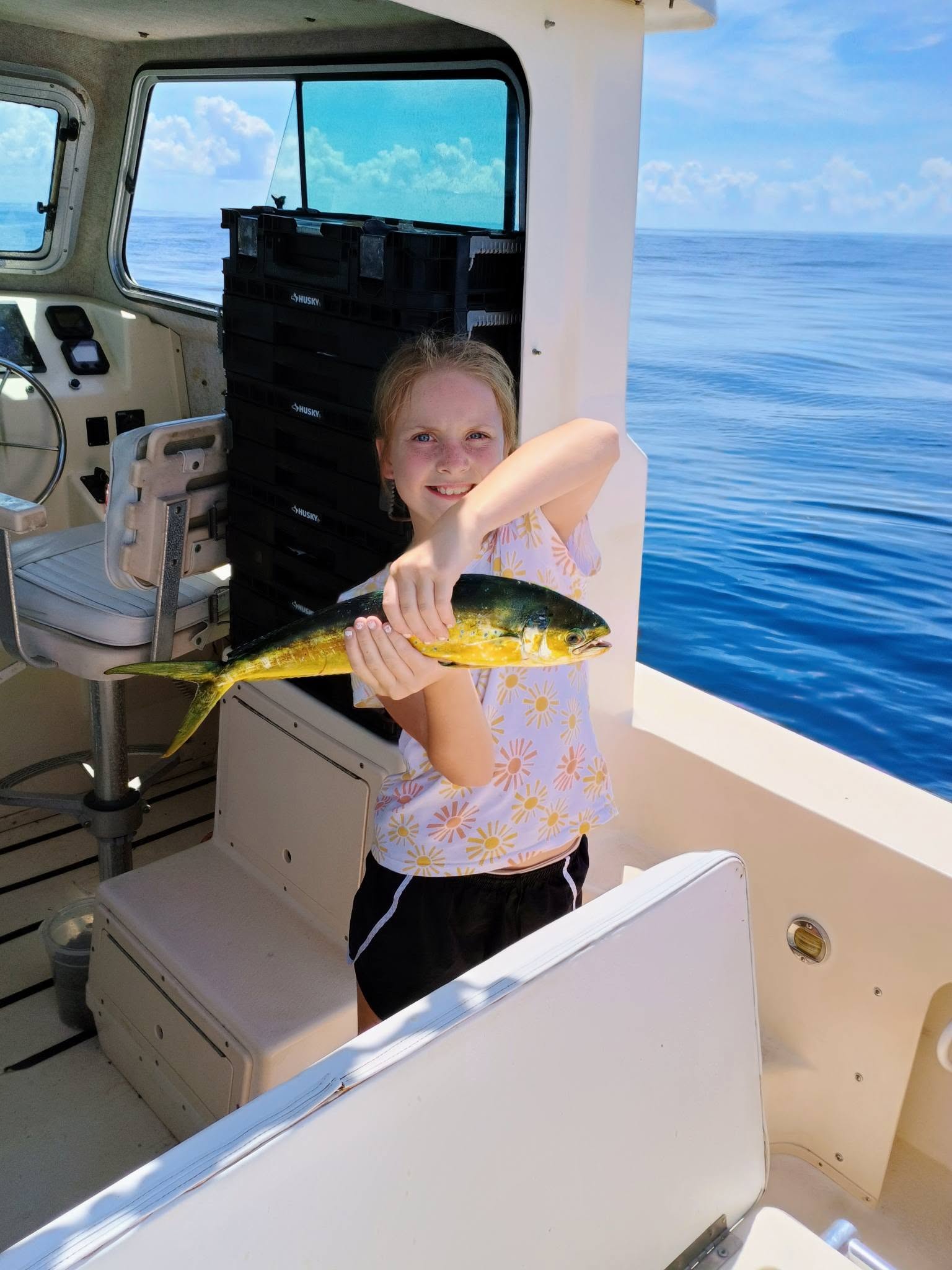 Mahi mahi catch displayed on fishing boat in Panama City FL