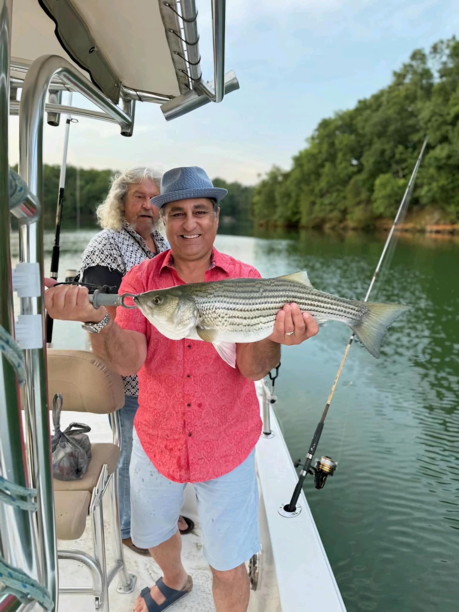 Striped bass catch displayed on fishing boat in Cumming GA