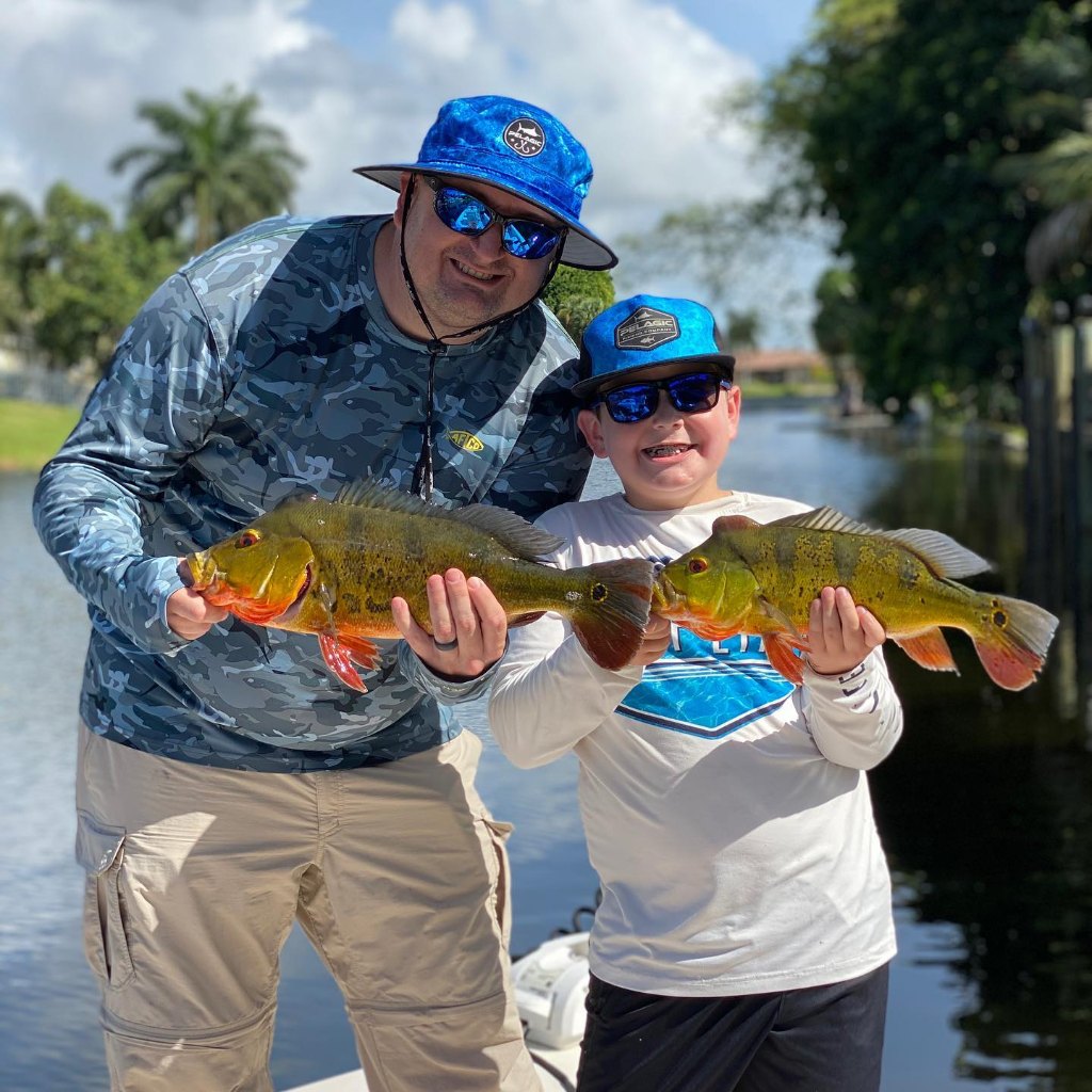 Two peacock bass fish caught in FL