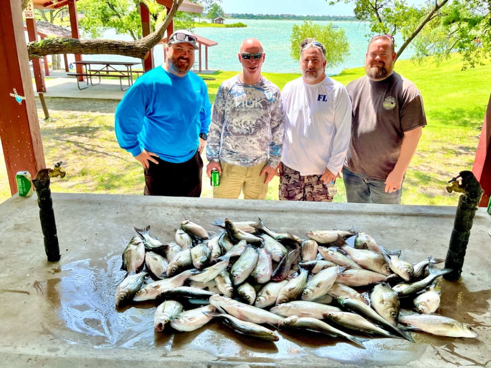 Four people fishing in TX