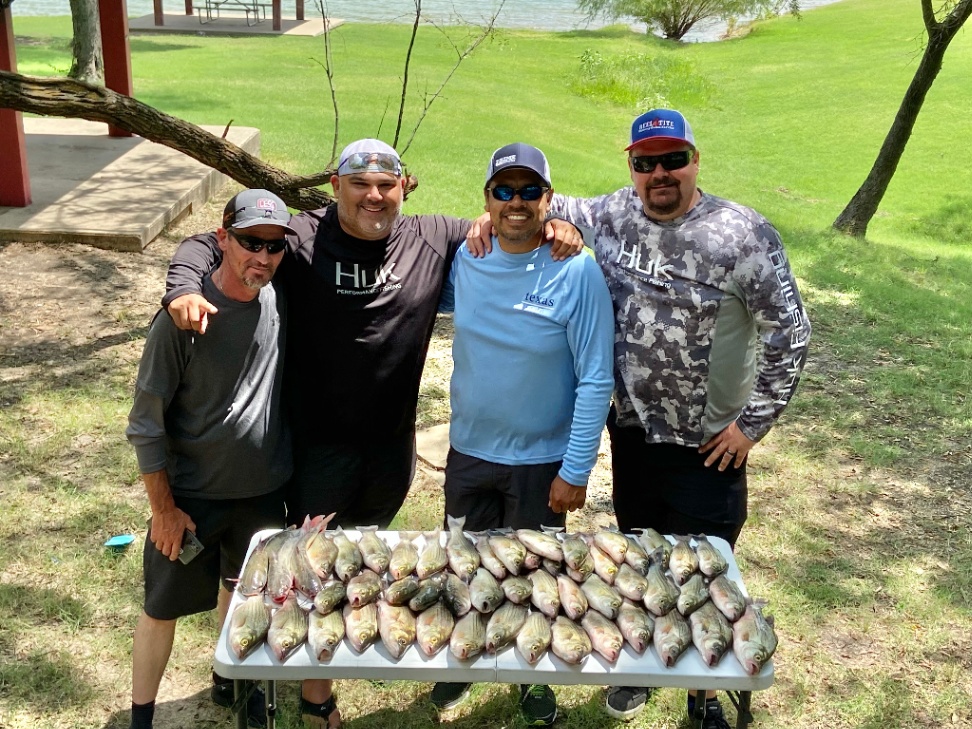 Four anglers enjoying a fishing trip in Frisco
