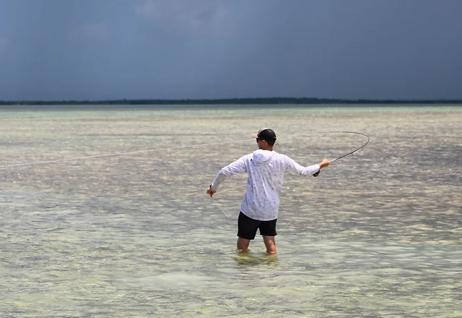 One person fishing on the shore of Big Pine Key