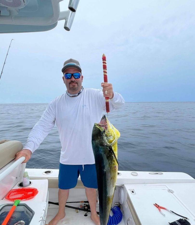 Large mahi mahi fish caught during deep sea fishing trip in Santa Rosa Beach Florida