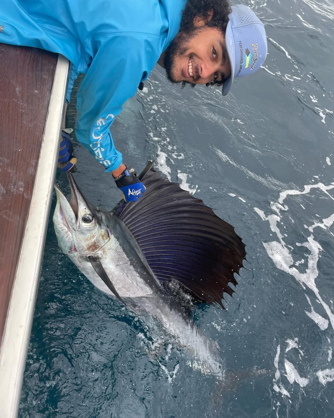 Angler reeling in an Atlantic Sailfish in FL