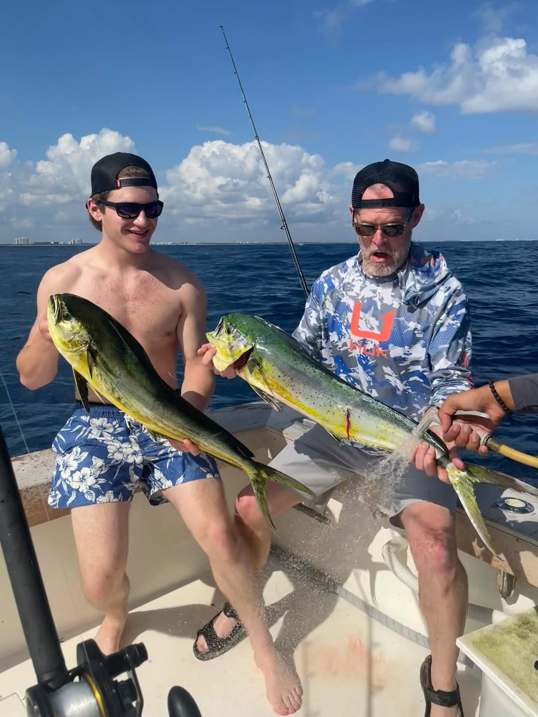 Offshore fishing charter boat departing West Palm Beach marina for half-day sailfish trip