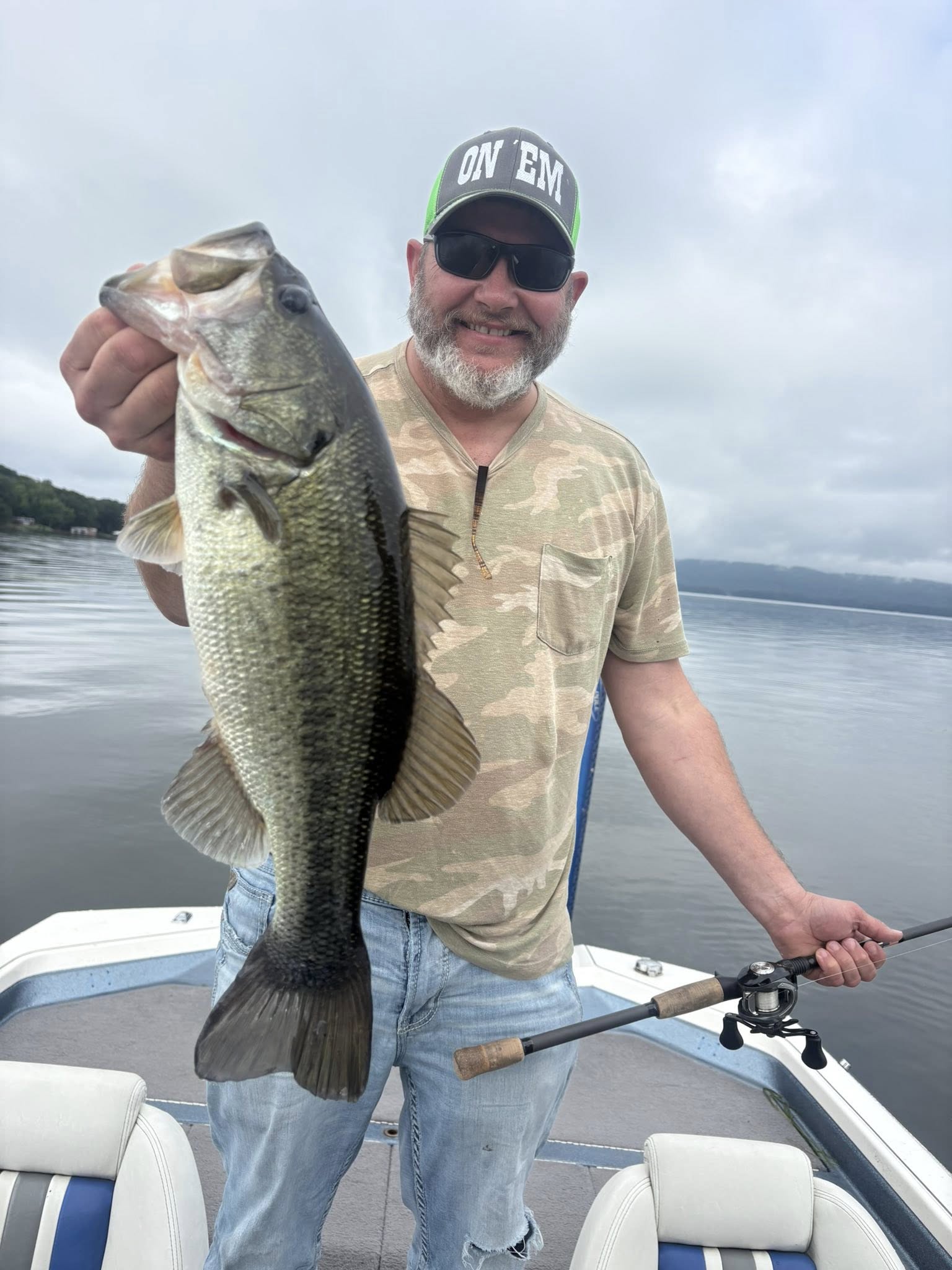 Large bass fish being held on fishing boat in Chattanooga TN waters